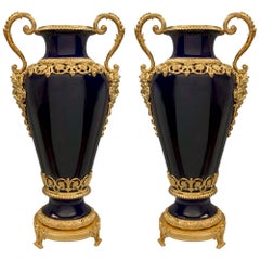 Pair of French 19th Century Louis XVI Style Sèvres Porcelain and Ormolu Vases