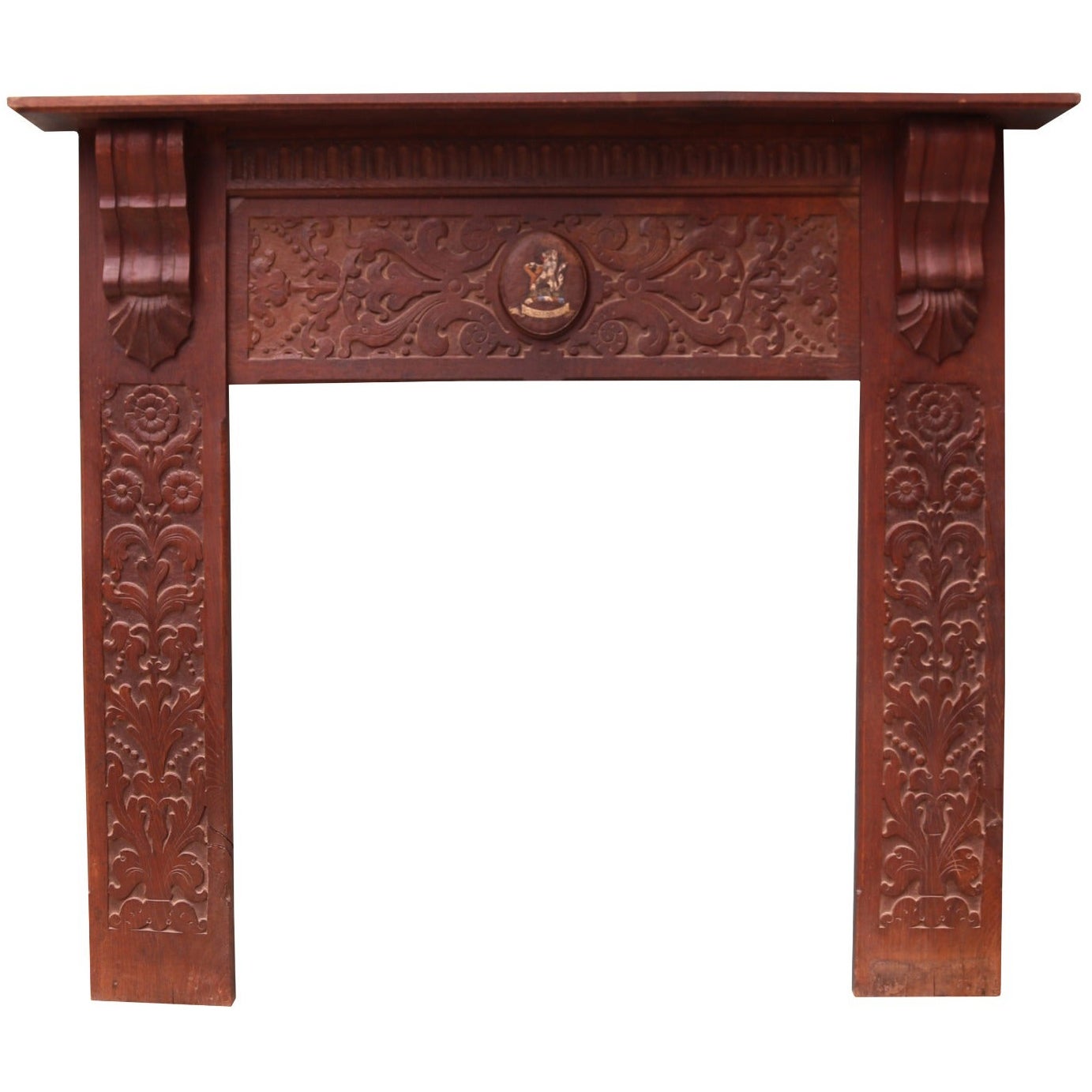 An Antique Jacobean Style Carved Oak Fireplace For Sale