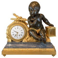 Reloj Figural de Bronce Dorado y Mármol de Beurdeley