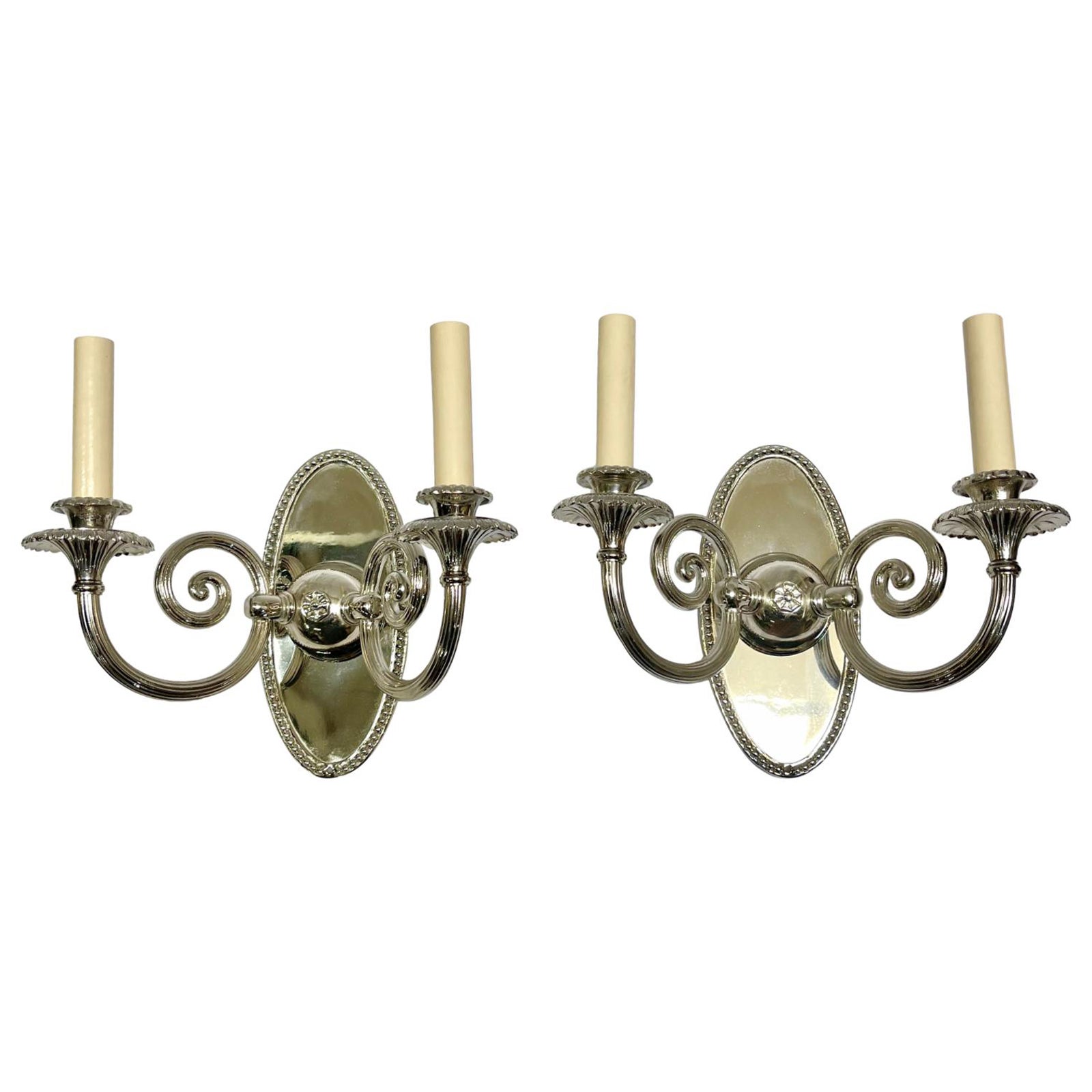 Pair of Neoclassic Style Silver Sconces For Sale