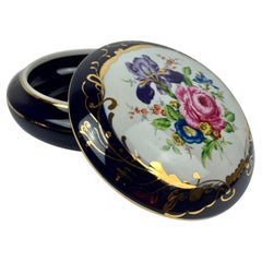 A. Sèvres Hand Painted Covered Porcelain Box in Cobalt Blue with Floral Motif