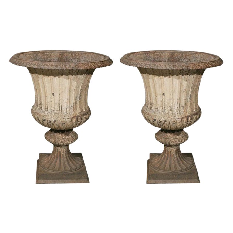 Large Pair of Cast Iron Fluted Urns