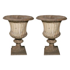 Large Pair of Cast Iron Fluted Urns