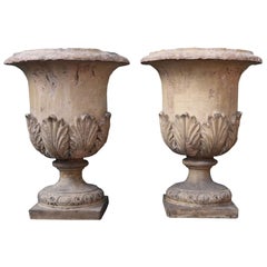 Two Antique Buff Terracotta Urns or Planters