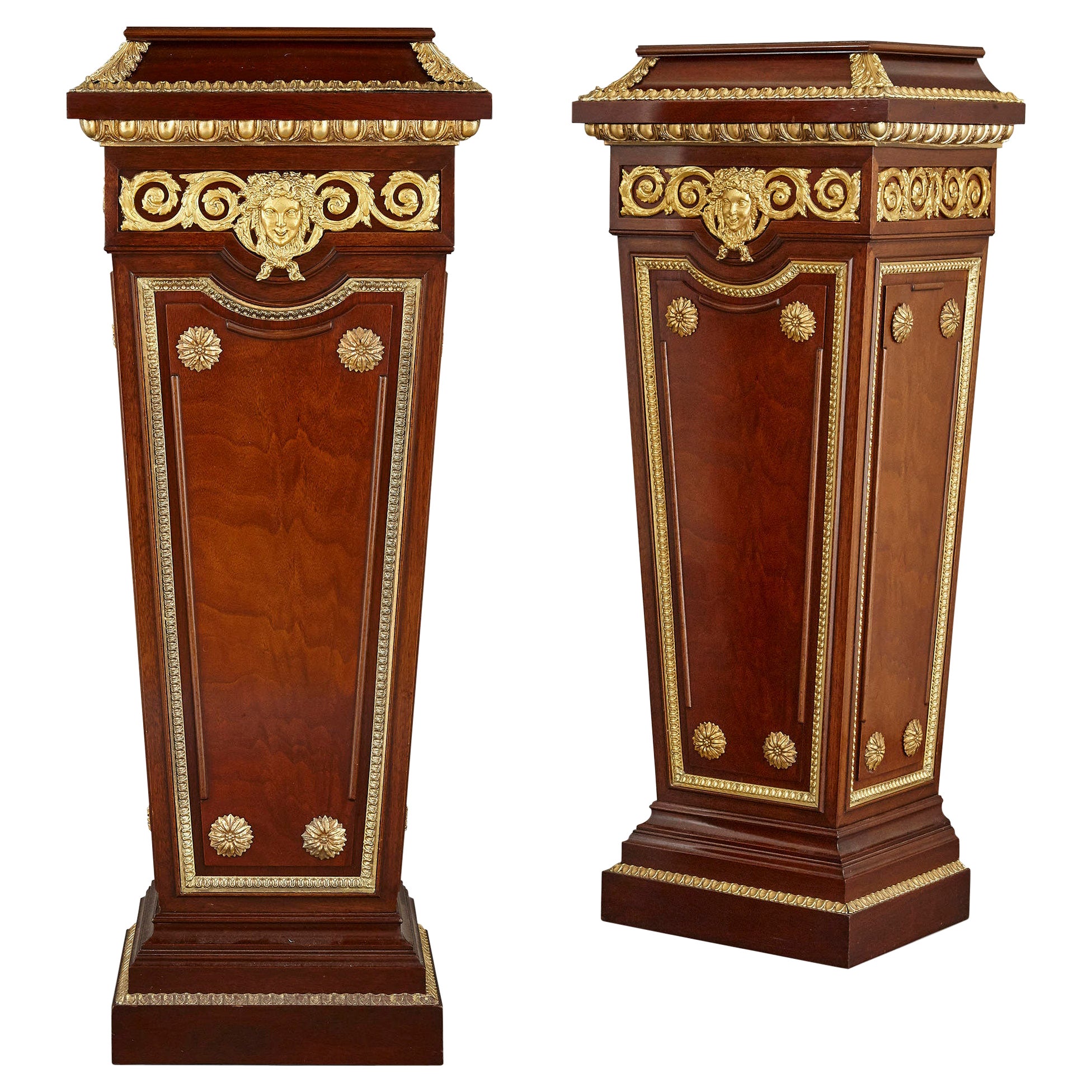 Pair of French Neoclassical Style Parcel Gilt Mahogany Pedestals