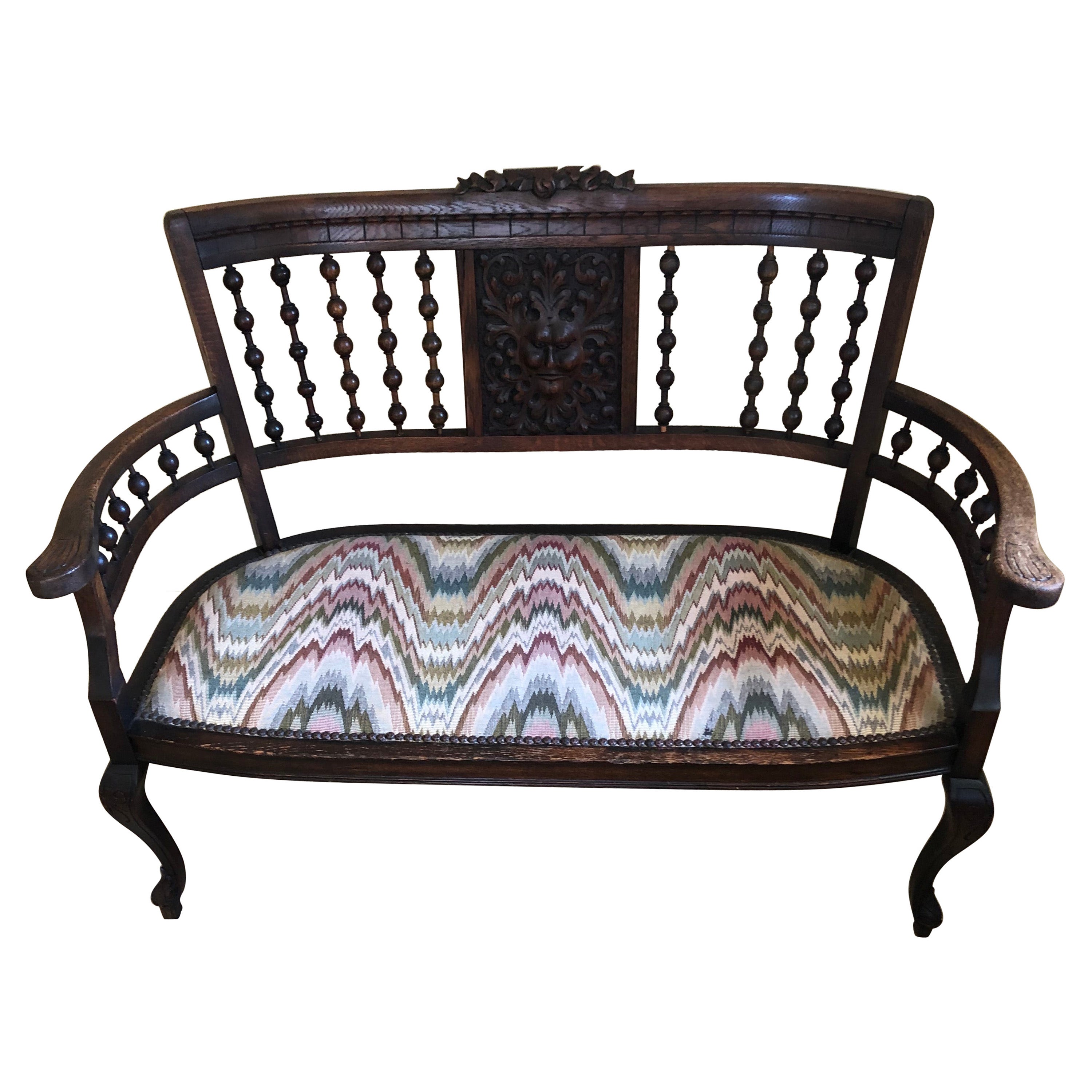 Quaint Small Victorian Carved Walnut Loveseat Settee with Flame Stitch Seat For Sale