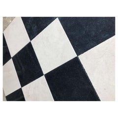 Campione di pavimentazione in marmo e pietra blu bianca e nera