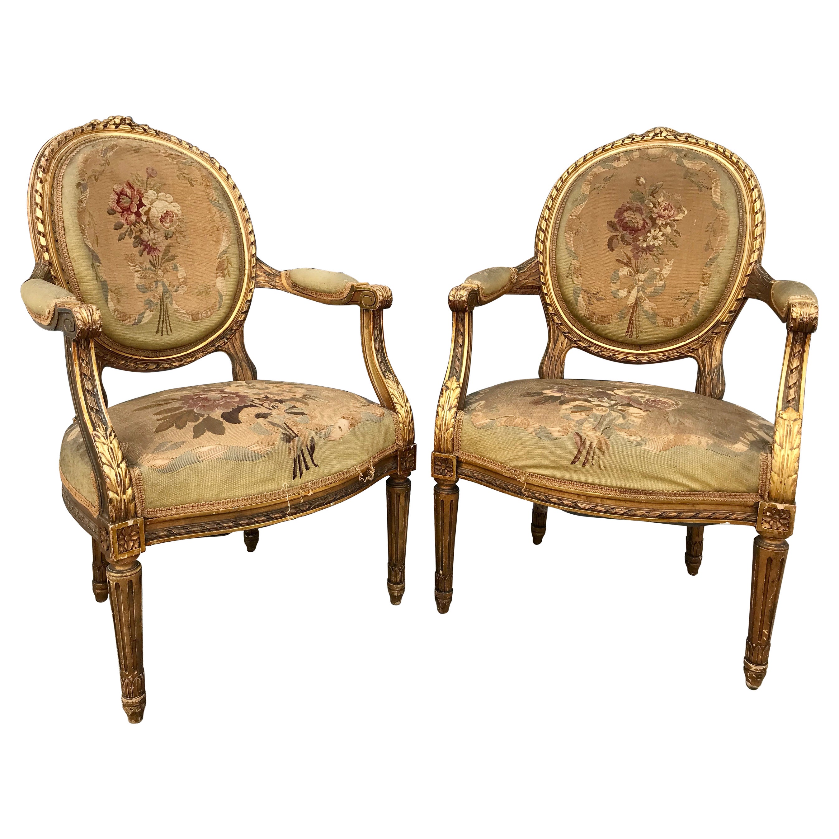 Pair of 19th Century Louis XVI Gilded Arm Chairs