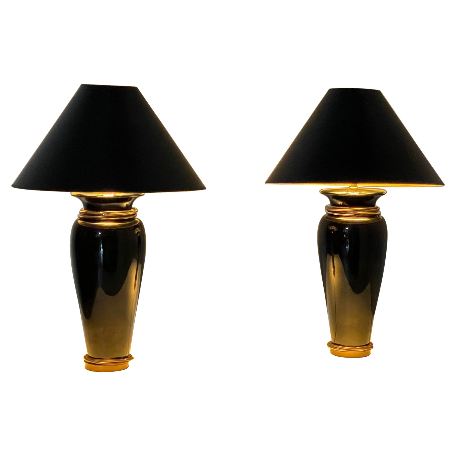 Glamorous Pair of Chapman Black Ceramic Table Lamps with Brass & Steel Rings For Sale