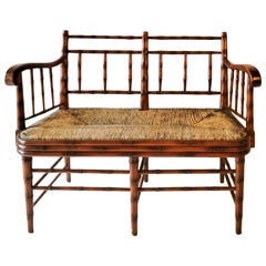 Late 20th Century French Style Faux Bamboo Settee with Rush Seat by Sarreid