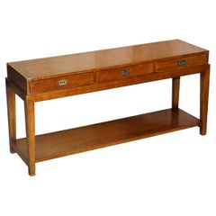 Used SOLID OAK MILITARY CAMPAIGN SIDEBOARD WITH THREE DRAWERS AND OPEN BASE - DISPLAy