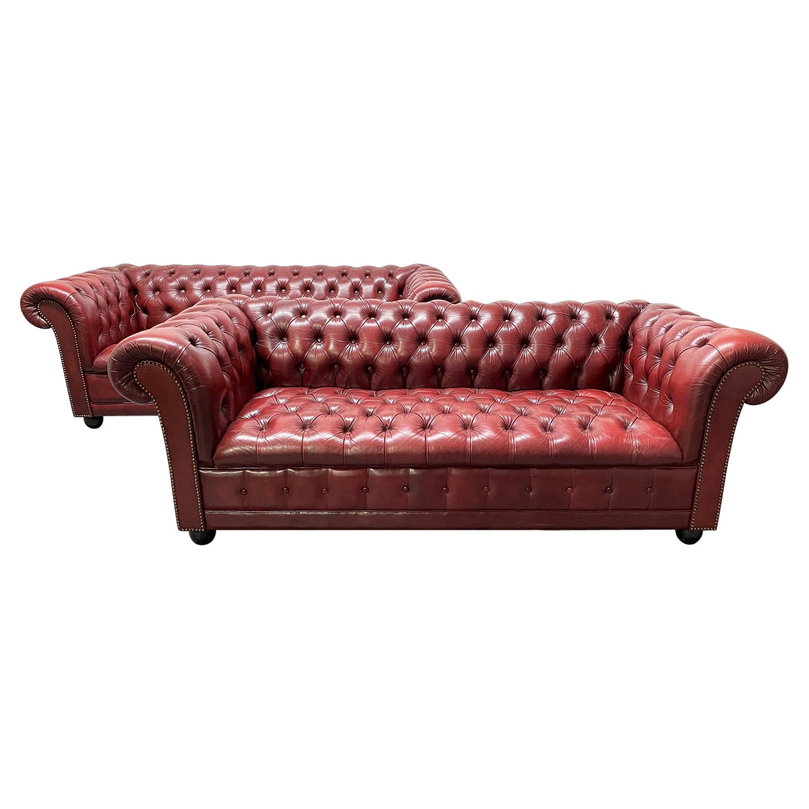 Pair Vintage Tufted Leather Chesterfield Sofas