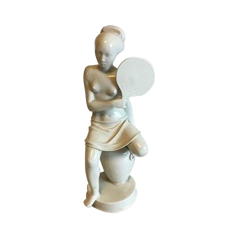 Royal Copenhagen Figurine of Woman with Fan No 12486 For Sale