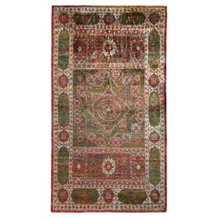 Alfombra de estilo transicional Rug & Kilim con estampado floral de medallones rojos y verdes
