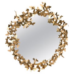 Miroir papillon en or vieilli