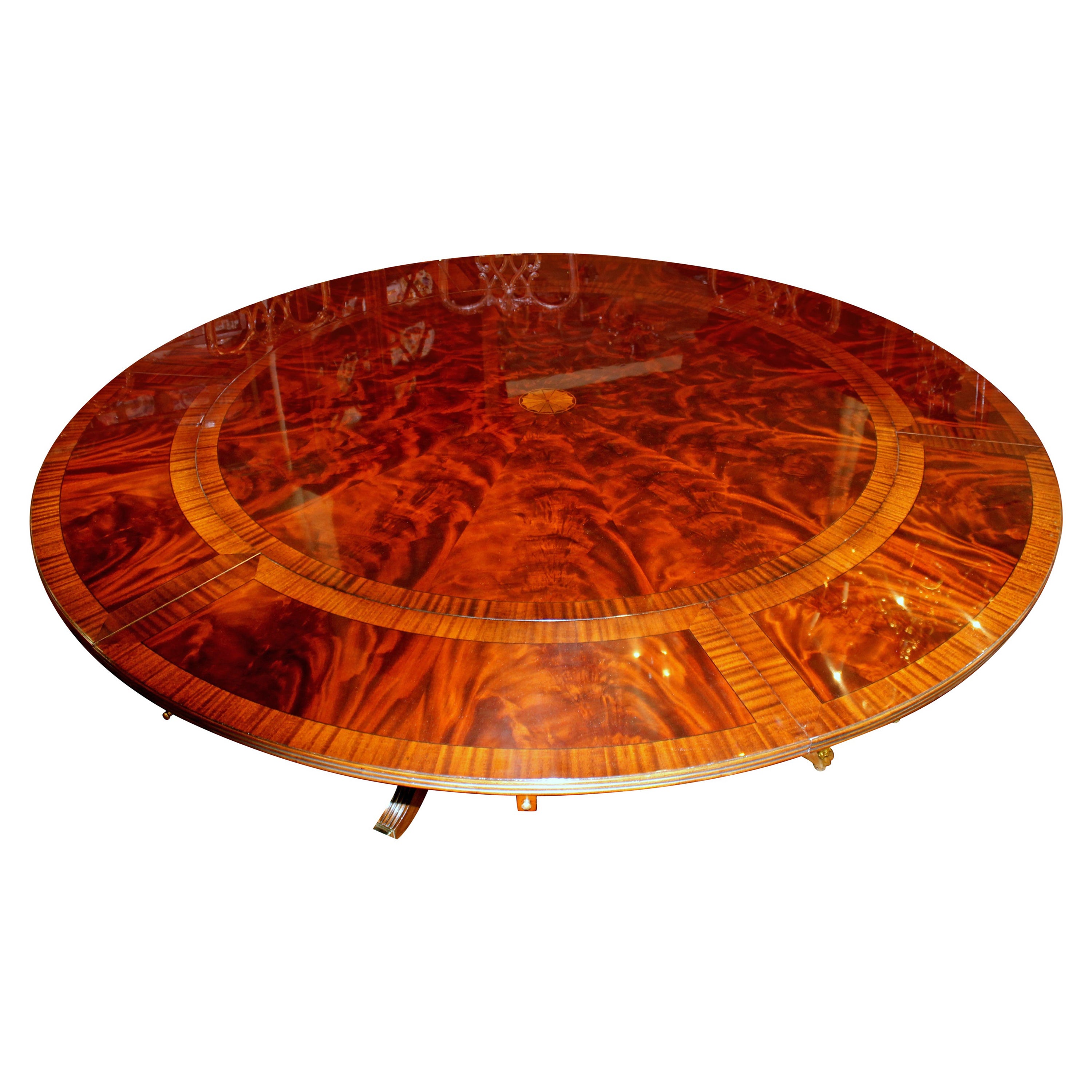 Benchmade Bookmatched Flame Mahogany Perimeter Leaf Circular Dining Table
