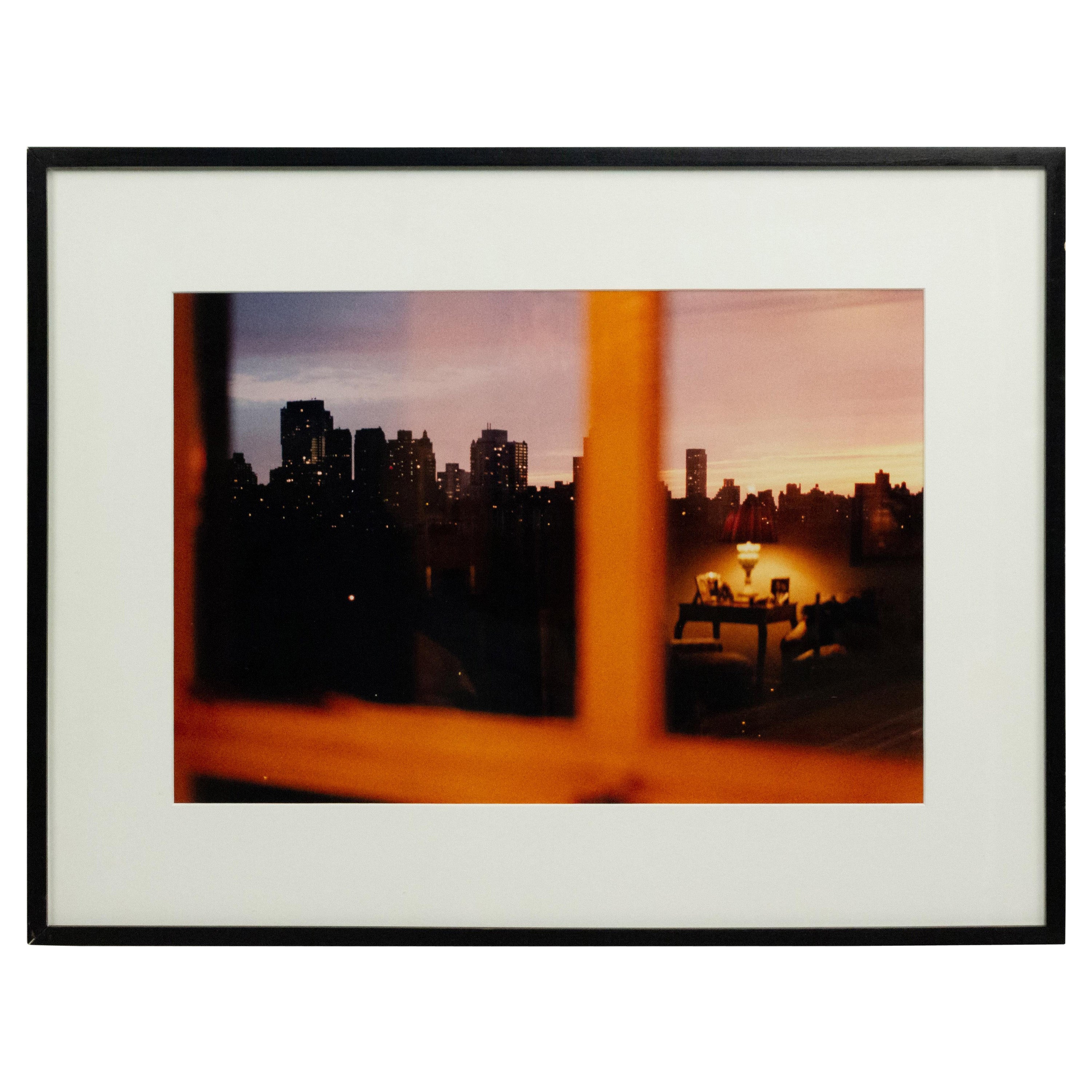 Color Photograph of a Cityscape in a Window
