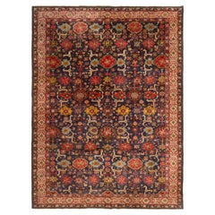 Antique German Blue and Red Rug with Floral Patterns
