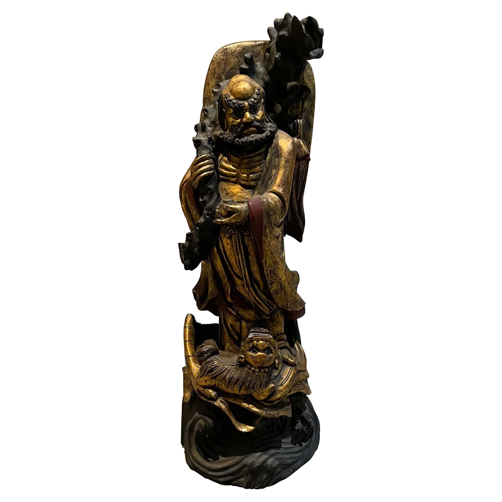 Intricate Chinese Immortal Deity Foo Dog Sculpture Carved Wood Gold Gilt & Black For Sale