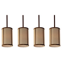 Vintage Set of Four 'Cylindre' Patinated Brass & Raffia Pendant Lights by Design Frères