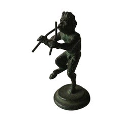 Bronce Figurine of a Pan Playing Flutes