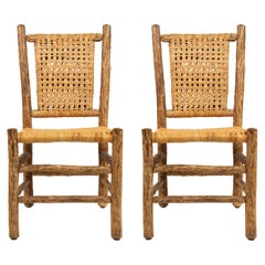Pair of Rustic Hickory Side Chairs with Cane Seats