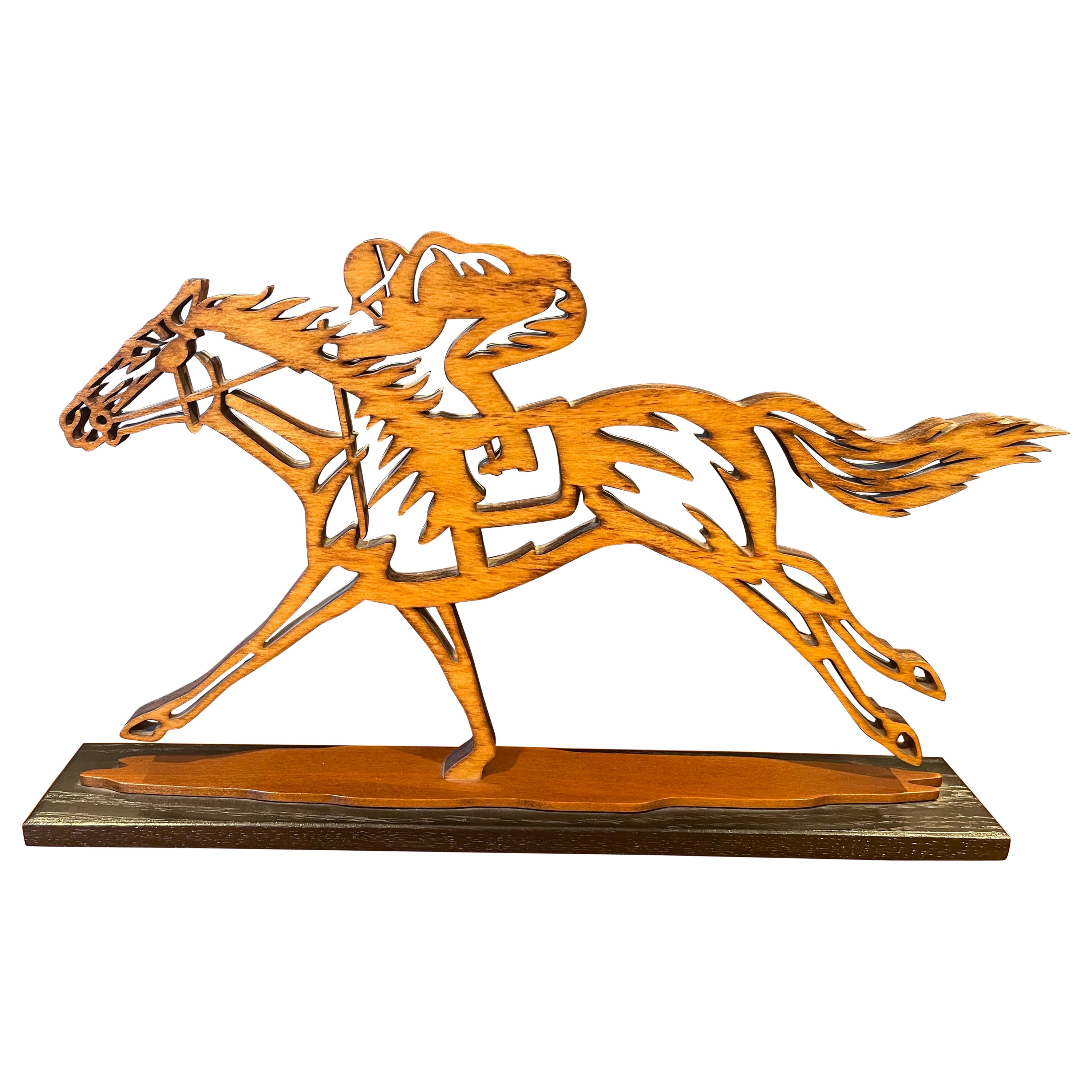 Sculpture en bois représentant des chevaux de course de pur-sang
