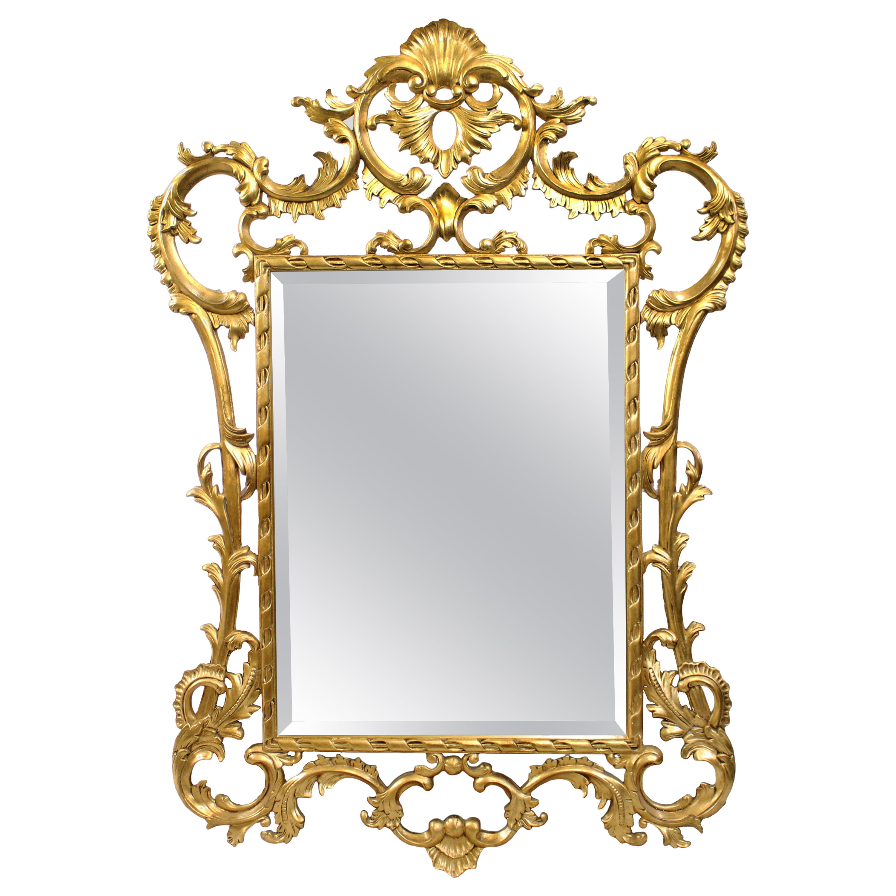 Ornately Hand Carved Giltwood Bevelled Glass Mirror For Sale