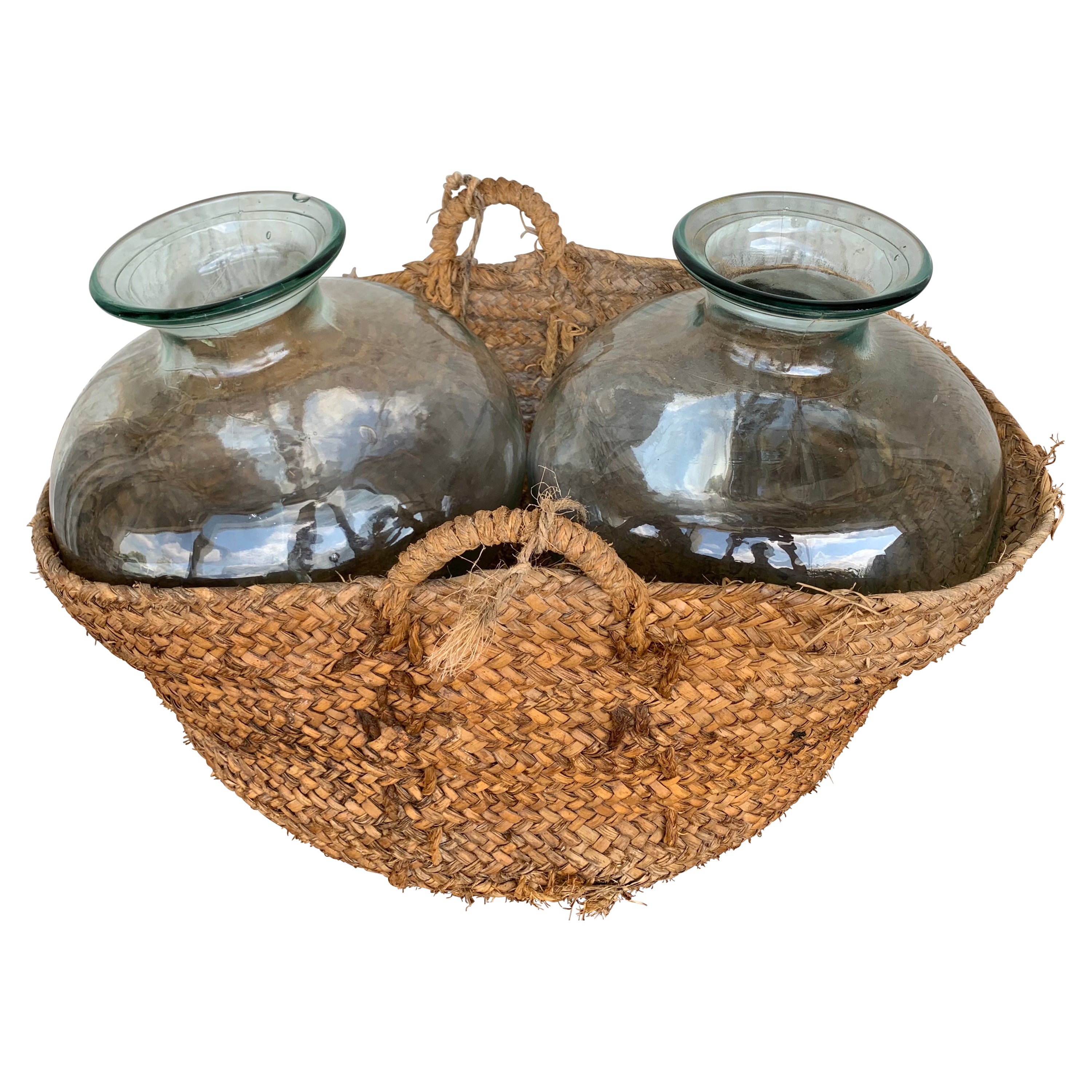 Set of 2 Green Glass French Demijohn Bottles with Woven Esparto Basket For Sale