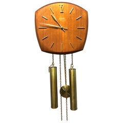 Vintage Junghans horloge murale à pendule en placage de teck des années 1960