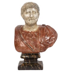 Busto de emperador romano pintado a la italiana