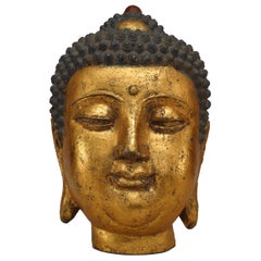 Chinese Iron and Gilt Buddha Bust