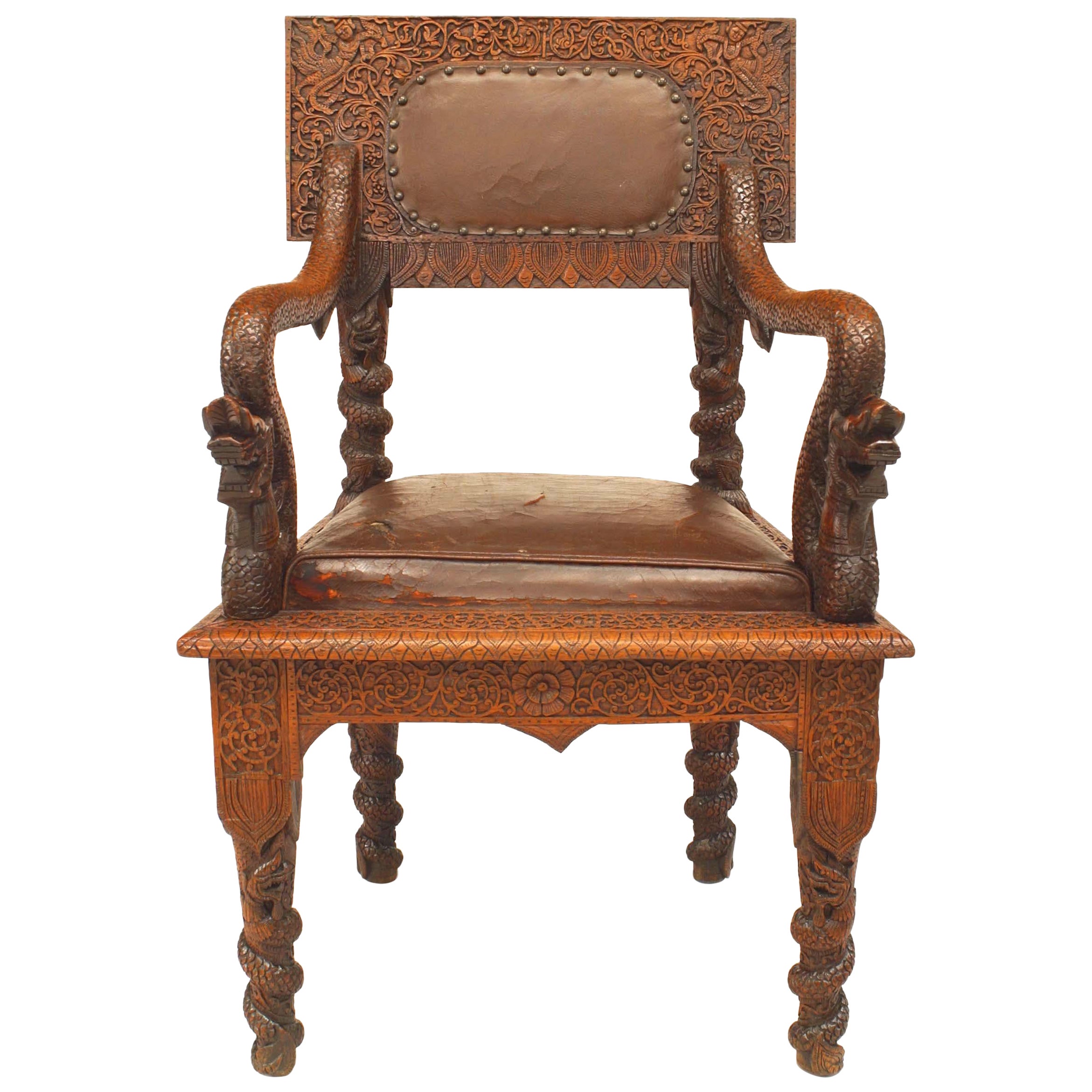 Burmese Carved Oak and Leather Armchair For Sale