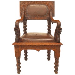 Burmese Carved Oak and Leather Armchair