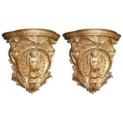 Pair of Gilded Hand Carved Cherubic Wall Brackets