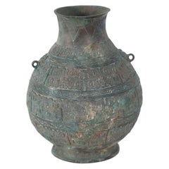 Chinese Han Dynasty Style Patinated Bronze Carved Urn