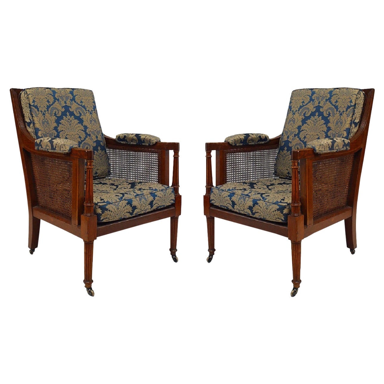 Pair of English Regency Oak Armchairs with Caned Panels and Cushioned Seats