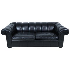 Vintage Modern Black Leather Channeled Sofa with Pull Out Bed