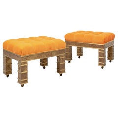Pair of Very Fine Signed Brass Upholstered Ottomans