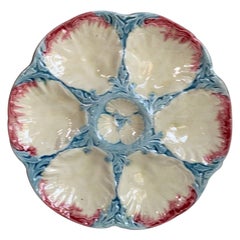Assiette à huîtres en majolique rose et bleue du 19ème siècle Gien
