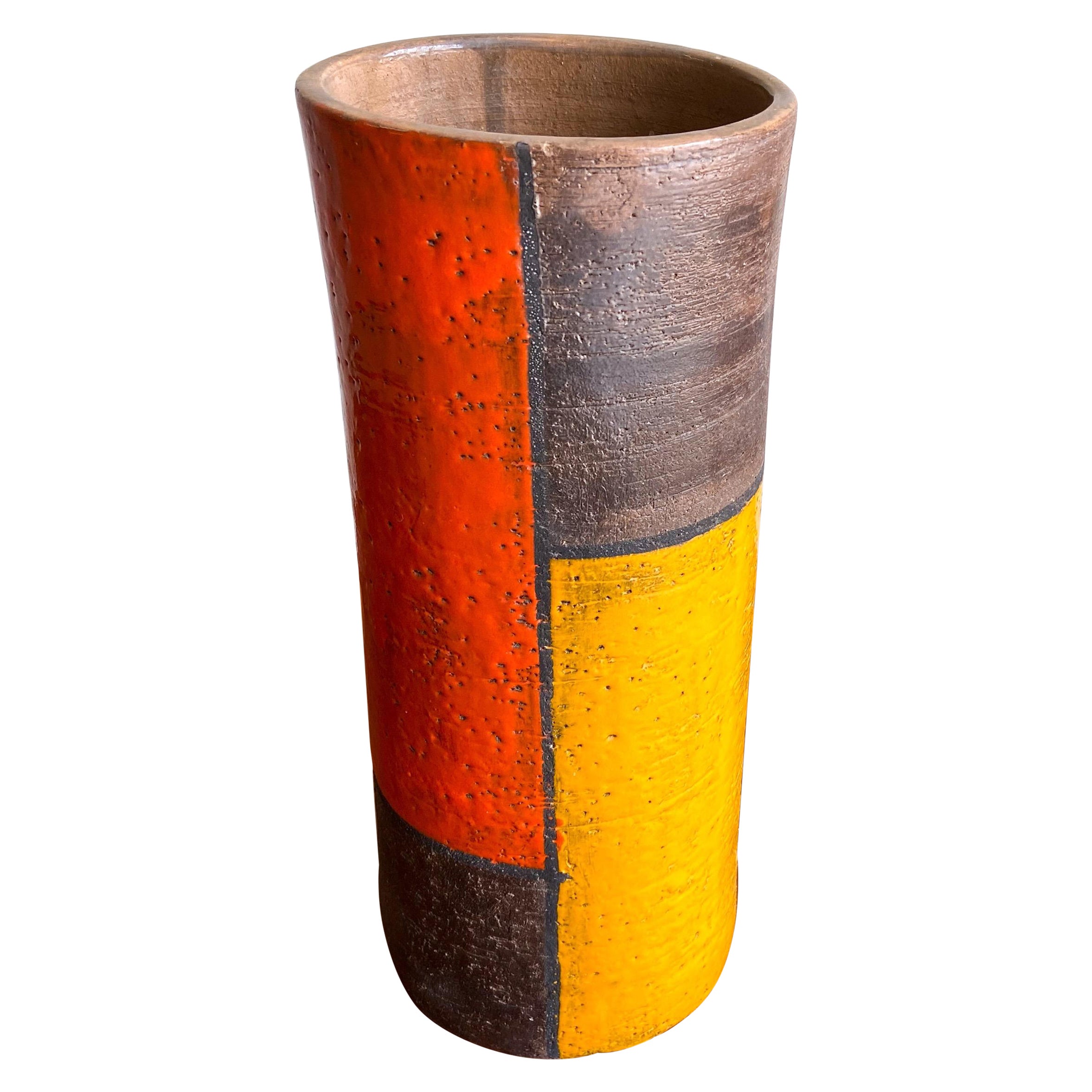 A large scale ceramic vase designed by Aldo Londi for Bitossi. Vibrant yellow and orange glaze over a textured brown clay body. Signed to the underside.