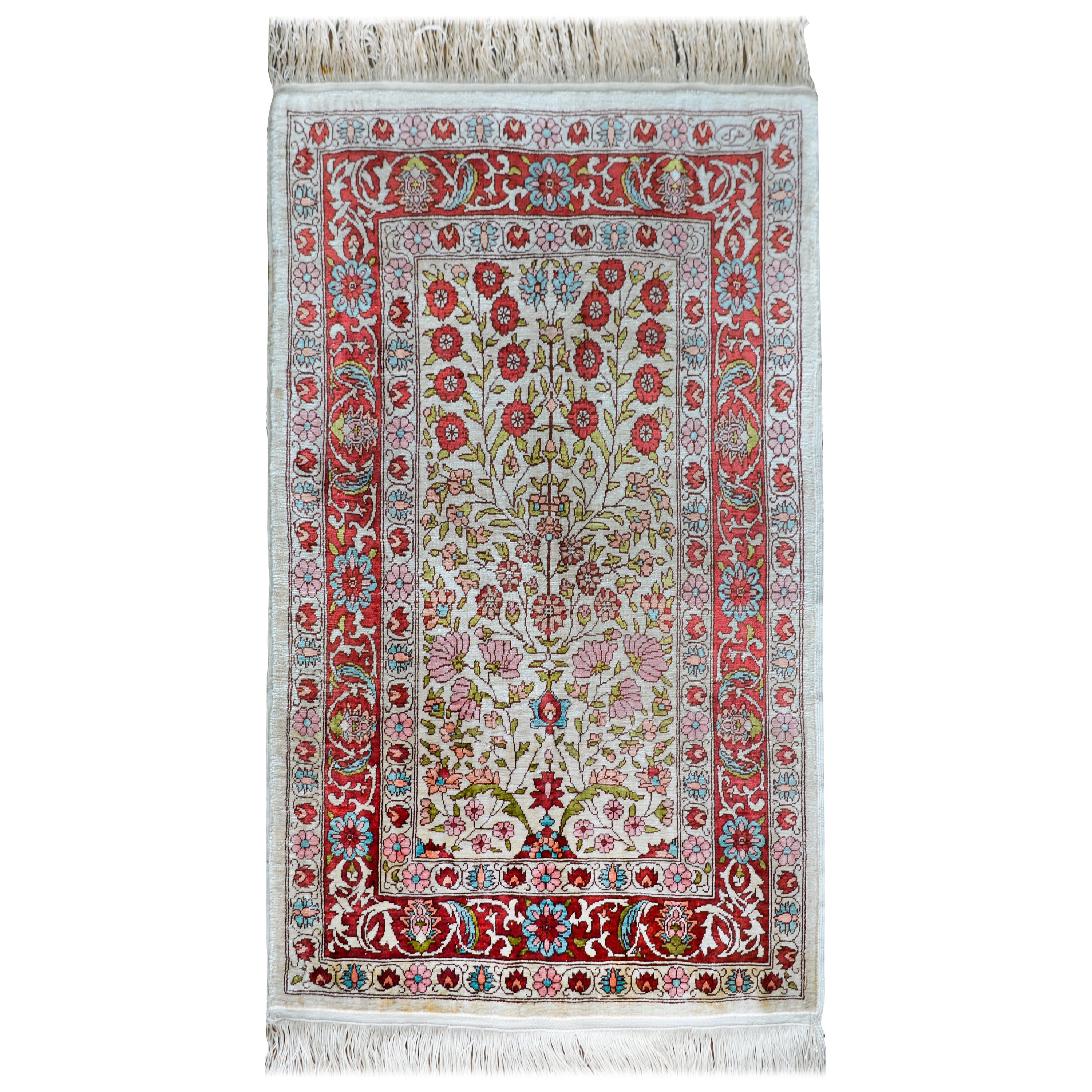 Vieux tapis turc en soie Hereke