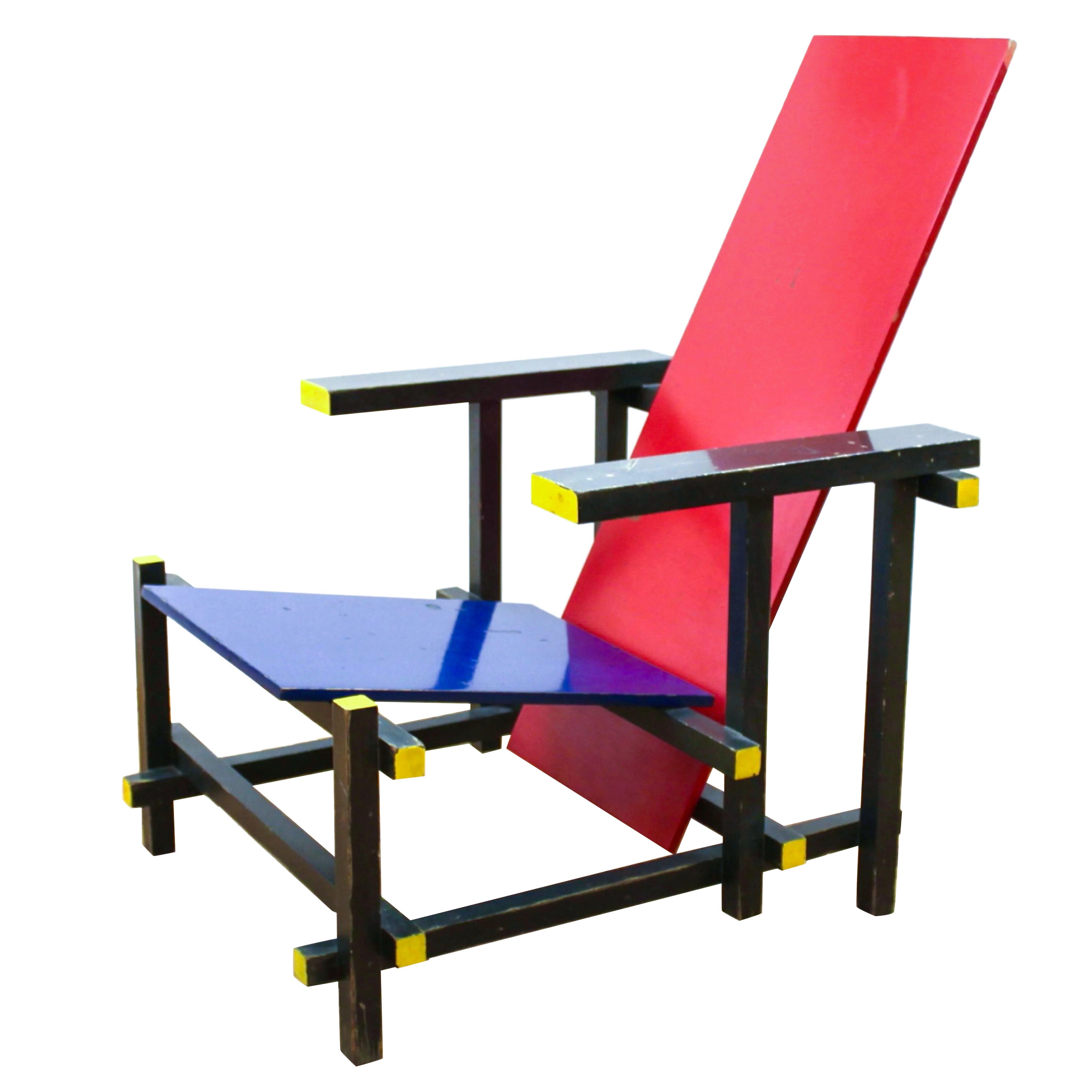 Gerrit rietveld Bauhaus red blue chair by Cassina. Early production. Authorized by Rietveld estate. Made in Italy. Labelled and numbered 556.
In the red blue chair, Rietveld manipulated rectilinear volumes and examined the interaction of vertical