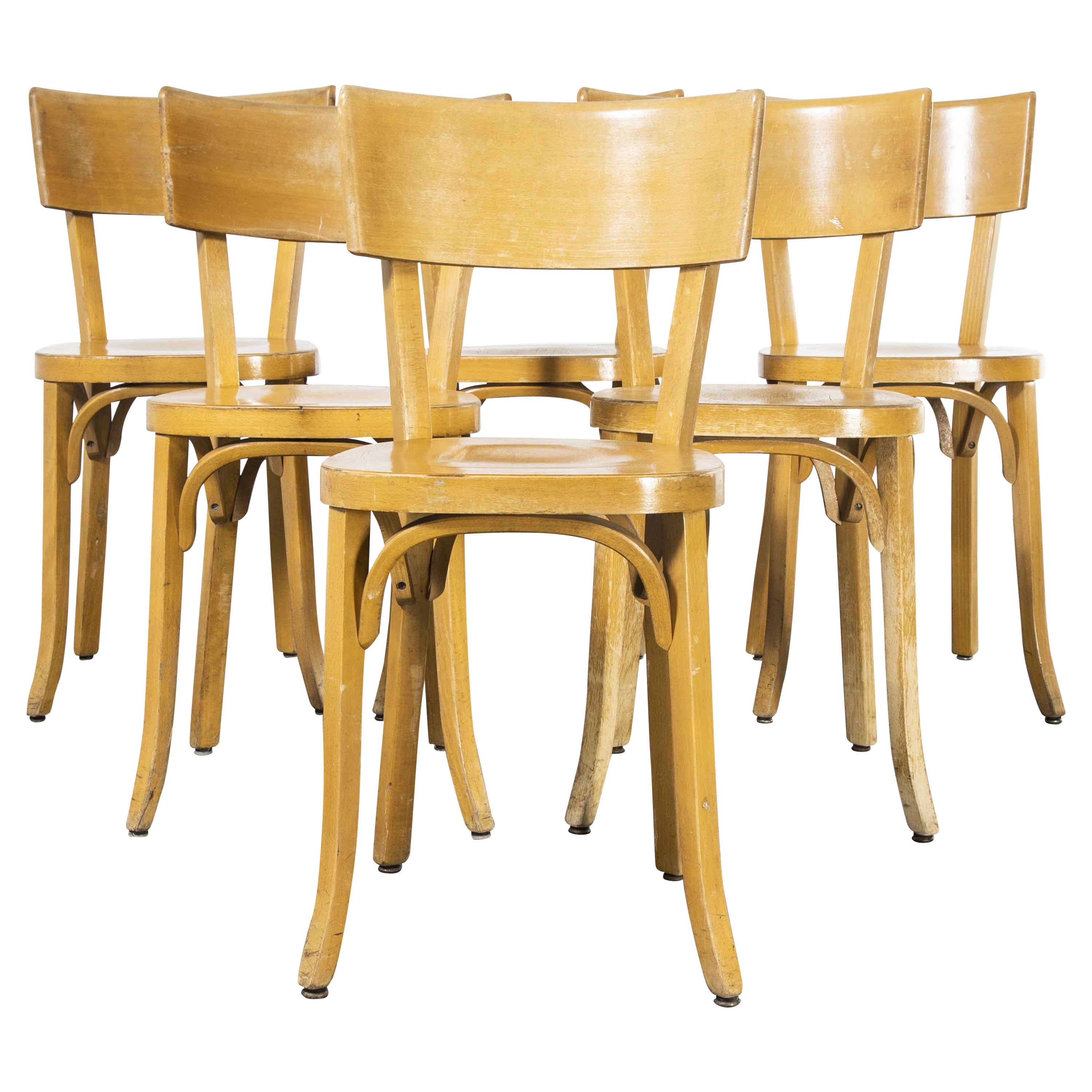 Ensemble de six chaises de salle à manger en bois de hêtre blond et cintré Baumann des années 1950, France