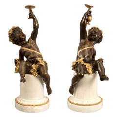 Pair of French 19th Century Louis XVI Style Statues of Joyful Cherubs