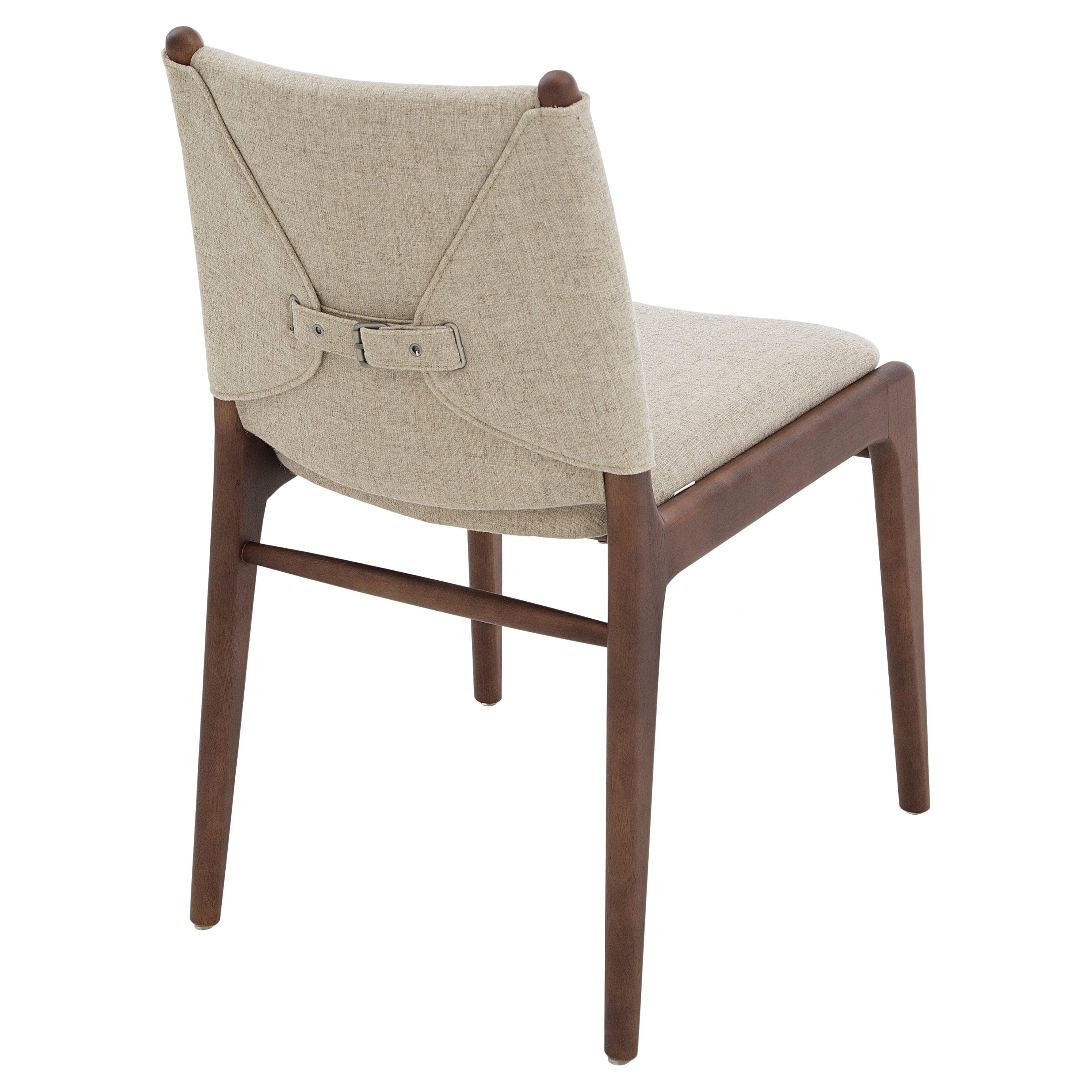 The Cappio chair highlights our beautiful walnut wood finish combined with a stunning beige fabric, this chair features a unique buckle design on the back of the seat. Our team at Uultis has designed this simple but elegant design that will
