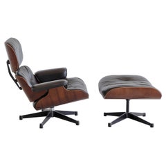 Charles & Ray Eames Loungesessel und Fußhocker, Vitra 1970er Jahre