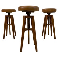 Mid Century Set of Three Danish Oak and Leather Stools