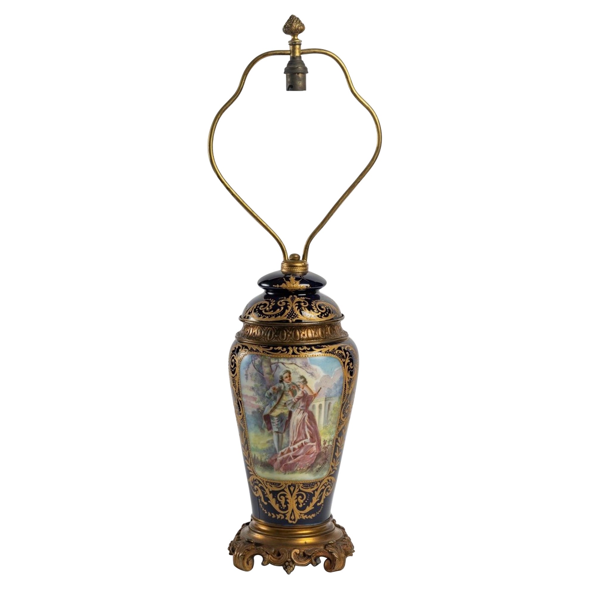 A Porcelain and Gilt Bronze Lamp Stand