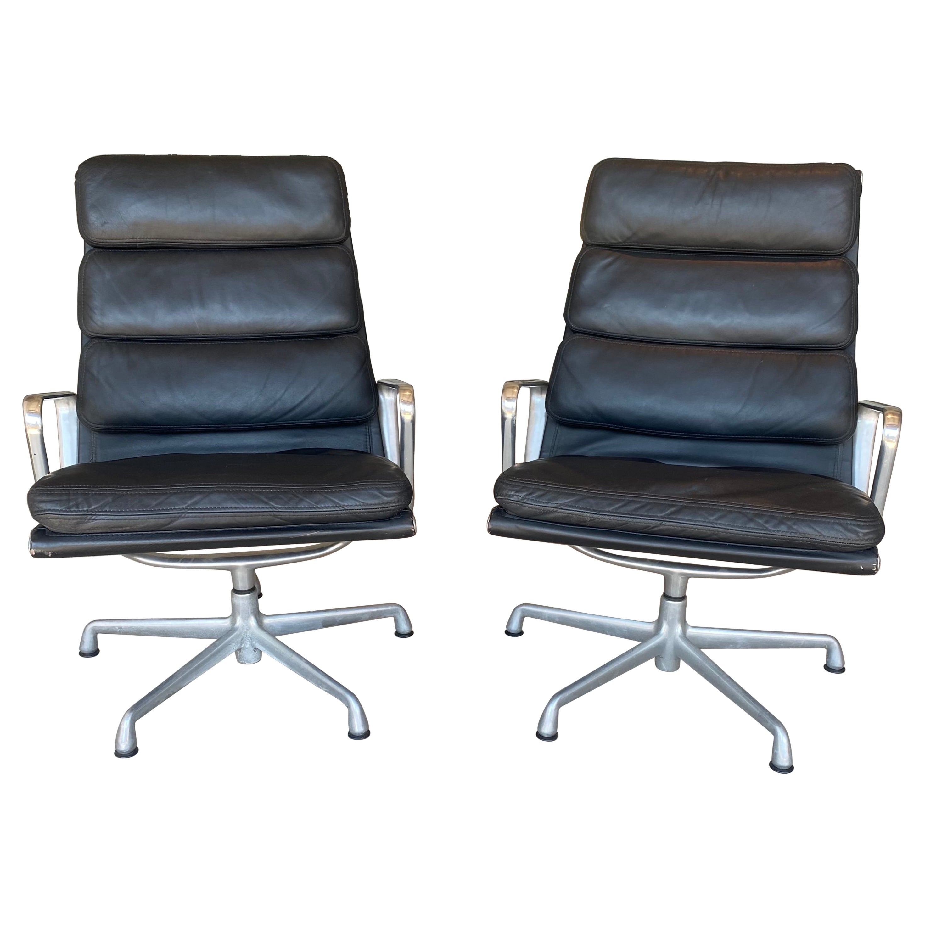 Pair of Black Leather Eames Soft Pad Aluminum Group Lounge Chairs